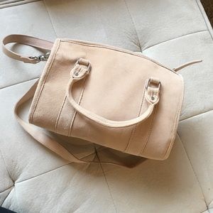 Salmon colored suede bag